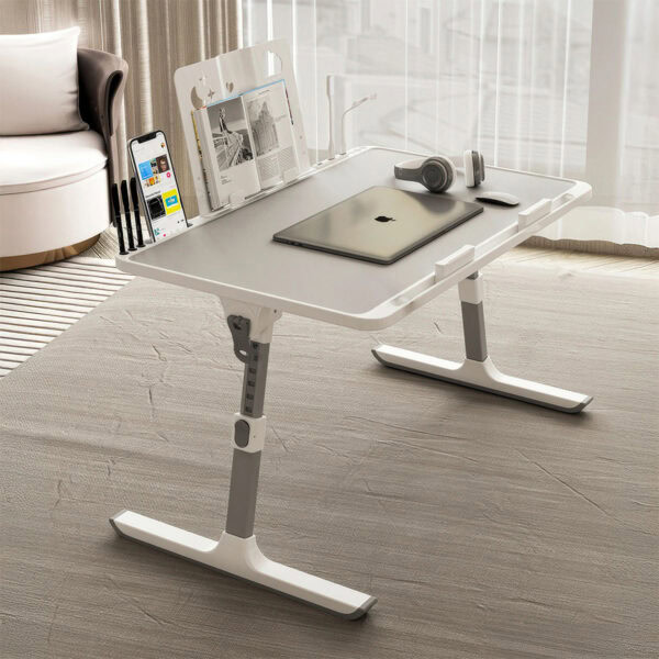 Modern dizüstü ve tablet çalışma masası, ergonomik ayarlanabilir yükseklik ve hafif tasarımıyla ofis ve ev kullanımı için ideal. Gelişmiş depolama alanı ve şık beyaz görünümle şıklık sağlar.