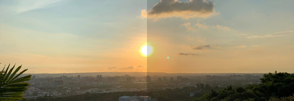 Gün batımını gösteren geniş manzara, sıcak renkler ve gökyüzündeki bulutlar ile huzurlu ve sakin bir atmosfer. Şehir silueti ve doğa unsurlarıyla birleşen güzel bir doğa görüntüsü.