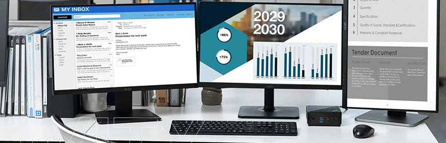 Yüksek çözünürlüklü bilgisayar ekranında finansal grafikler ve raporlar gösteriliyor, ofis ortamında çok monitörlü çalışma alanı.