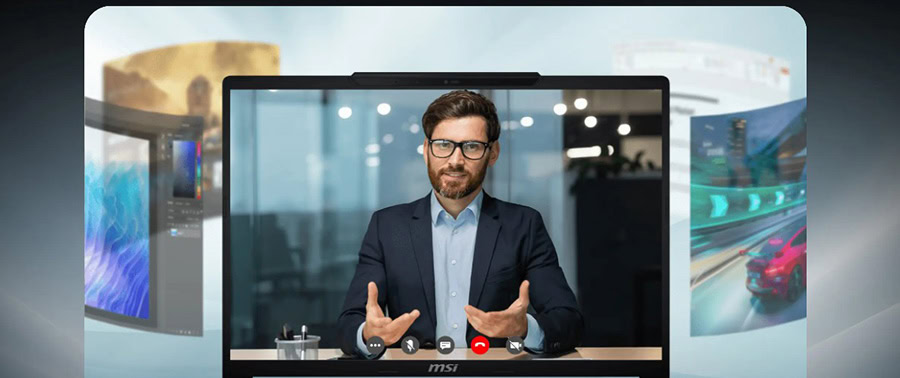 Güzel giyimli adam, MSI Crosshair 16 Max HX dizüstü bilgisayarla video konferans yapıyor, modern ofis ortamında.