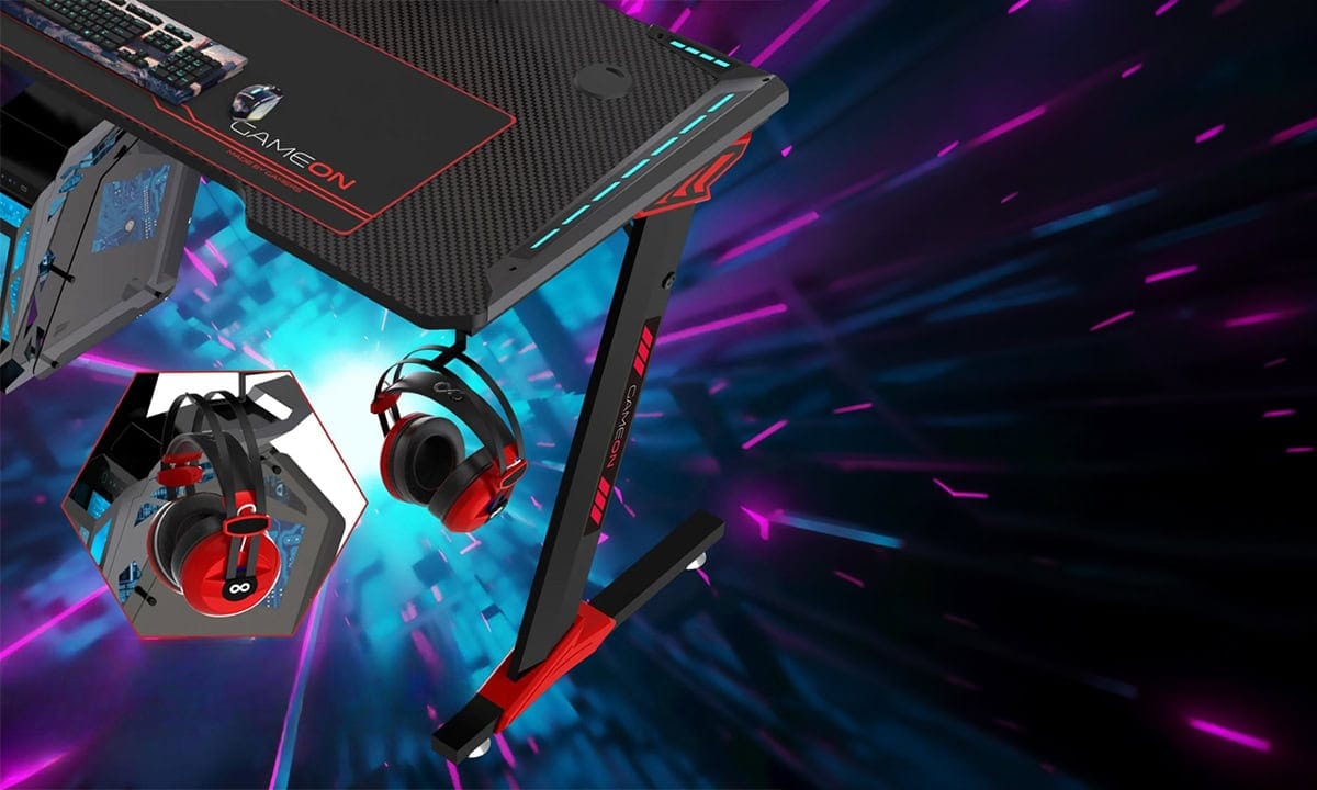 Siyah GAMEON Raptor II RGB aydınlatmalı oyuncu masası, 140x60 cm boyutlarında, modern tasarım ve RGB ışıklandırma ile oyun deneyimini artırır.